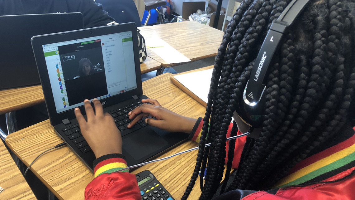 Student works on laptop