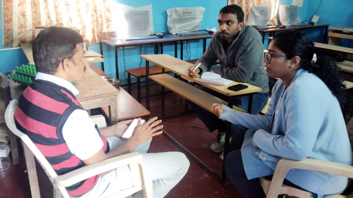Thammanna H N/Provided Caption: Deepak Varuvel Dennison, a Ph.D. student in information science at Cornell (center) and Rijutha Raj from Sikshana Foundation (right) talk with a middle school teacher to understand their experience using Shiksha Copilot.