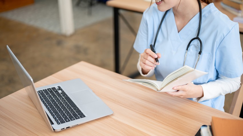 Medical student looking at computer