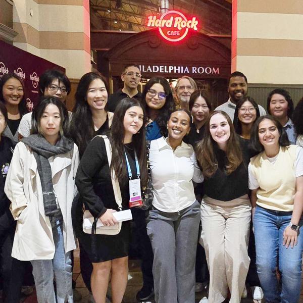 a group of women pose together