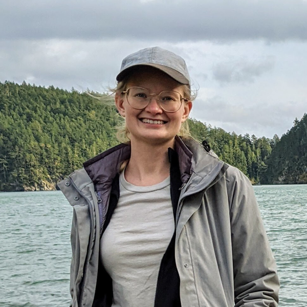 Portrait of Sarah Dean an AI2050 Fellow standing outside