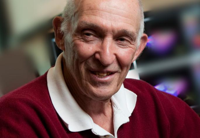Don Greenberg in red sweater