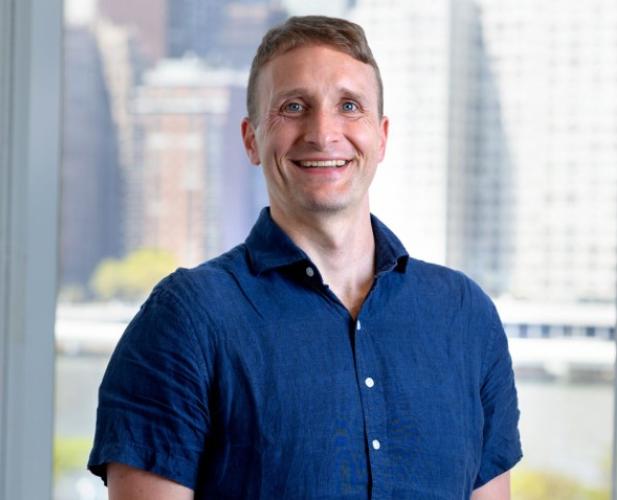 Portrait of Assistant professor Alex Conway 
